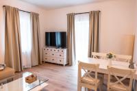 Televízia a/alebo spoločenská miestnosť v ubytovaní Apartment ReRo