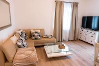 Televízia a/alebo spoločenská miestnosť v ubytovaní Apartment ReRo