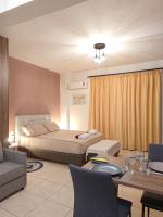 Łóżko lub łóżka w pokoju w obiekcie Bill Apartments