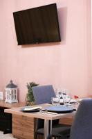 Telewizja i/lub zestaw kina domowego w obiekcie Bill Apartments