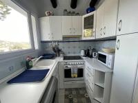 A kitchen or kitchenette at Villa Mediterraneo