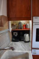 A kitchen or kitchenette at Dolichi House