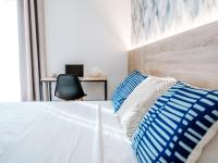 Posteľ alebo postele v izbe v ubytovaní Sweet Lloret Suites
