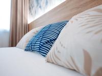 Posteľ alebo postele v izbe v ubytovaní Sweet Lloret Suites