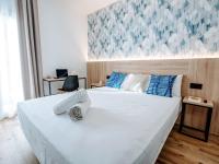 Posteľ alebo postele v izbe v ubytovaní Sweet Lloret Suites