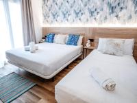 Posteľ alebo postele v izbe v ubytovaní Sweet Lloret Suites