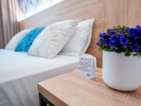 Posteľ alebo postele v izbe v ubytovaní Sweet Lloret Suites