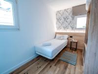 Posteľ alebo postele v izbe v ubytovaní Sweet Lloret Suites