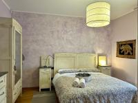 Posteľ alebo postele v izbe v ubytovaní Giulia apartment and room