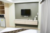 TV a/nebo společenská místnost v ubytování La Porte Hotel Bangkok