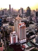an aerial view of a city with tall buildings at Bandara Suites Silom, Bangkok in Bangkok