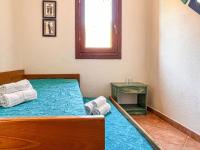 A bed or beds in a room at Villetta Gaia