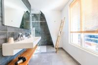 a bathroom with a sink and a mirror at Best Western Hotel De La Plage Saint Marc sur Mer in Saint-Nazaire