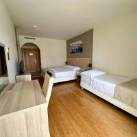 Posteľ alebo postele v izbe v ubytovaní Hotel Villa MiraMar