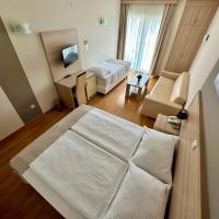 Posteľ alebo postele v izbe v ubytovaní Hotel Villa MiraMar
