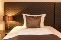 Ein Bett oder Betten in einem Zimmer der Unterkunft Mauritius Hotel & Therme