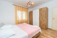 Posteľ alebo postele v izbe v ubytovaní Apartment Near the center and beach