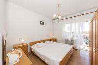 Posteľ alebo postele v izbe v ubytovaní Apartment Near the center and beach
