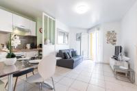 a living room and kitchen with a couch and a table at Quiet 1 bdr Port! close Place du Pin Garibaldi in Nice