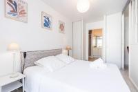 a white bedroom with two beds and a lamp at Quiet 1 bdr Port! close Place du Pin Garibaldi in Nice