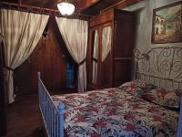 Posteľ alebo postele v izbe v ubytovaní Gîte le rocher du château de Retourtour