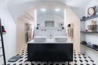 a bathroom with two sinks and a mirror at Wonderful luxury house at 10min from Paris in Meudon