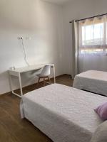 Posteľ alebo postele v izbe v ubytovaní Rosa de la laguna