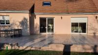 a patio in front of a house at Le chaudron vert in Moncé-en-Belin