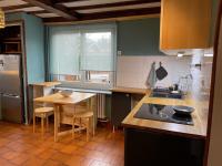 a kitchen with a sink and a counter top at Appartement à Uriage les Bains. in Vaulnaveys-le-Haut