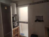 A kitchen or kitchenette at APT ALCAZABA by Malaga Picasso Rentals Selection