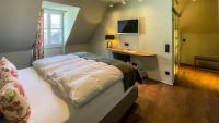 Boutique Hotel Orangerieにあるベッド