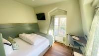 Boutique Hotel Orangerieにあるベッド