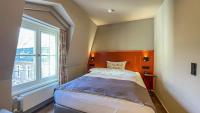 Boutique Hotel Orangerieにあるベッド