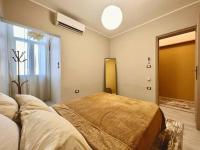 Postel nebo postele na pokoji v ubytování Boho-Chic 2 bedrooms in Zamalek (no visits)
