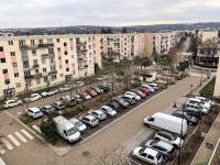 an aerial view of a parking lot with parked cars at Confort Parisien - parking gratuit - Chaleureux in Rueil-Malmaison