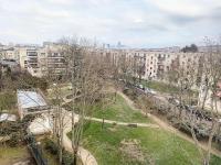 a park with trees and buildings in a city at Confort Parisien - parking gratuit - Chaleureux in Rueil-Malmaison