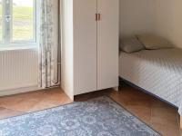 Postel nebo postele na pokoji v ubytování Holiday home Vollsjö
