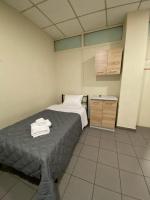 Posteľ alebo postele v izbe v ubytovaní Dima Rooms And Apartments