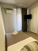 Posteľ alebo postele v izbe v ubytovaní Dima Rooms And Apartments