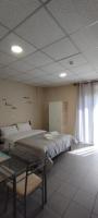 Posteľ alebo postele v izbe v ubytovaní Dima Rooms And Apartments