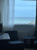 a room with a window with a view of the ocean at Hotel Venus in Venus