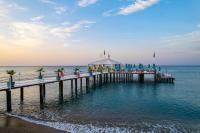 a pier on the water with a gazebo at Concorde De Luxe Resort - Prive Ultra All Inclusive in Lara