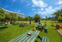 a picnic table with a toy on it in a park at Concorde De Luxe Resort - Prive Ultra All Inclusive in Lara