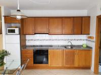 Kuchyň nebo kuchyňský kout v ubytování A H RENTALS Montemar 10 Apartamento Atalayas