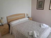 Postel nebo postele na pokoji v ubytování A H RENTALS Montemar 10 Apartamento Atalayas