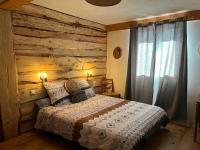 Posteľ alebo postele v izbe v ubytovaní Gîte Ranch Le Serpolet