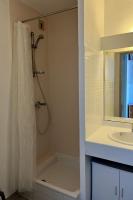 a bathroom with a shower and a sink at Apartment Le Sunset-Cap Sud-23 by Interhome in Cap d&#39;Agde
