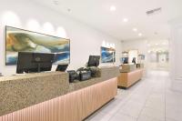 a lobby of a store with a cash register and a counter at Hilton Irvine/Orange County Airport in Irvine