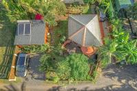 an aerial view of a house with a car in front at Cazadodo in Étang-Salé