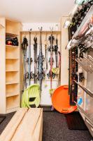 a room with a bunch of skis on a wall at Haus Kella-Egg in Brand